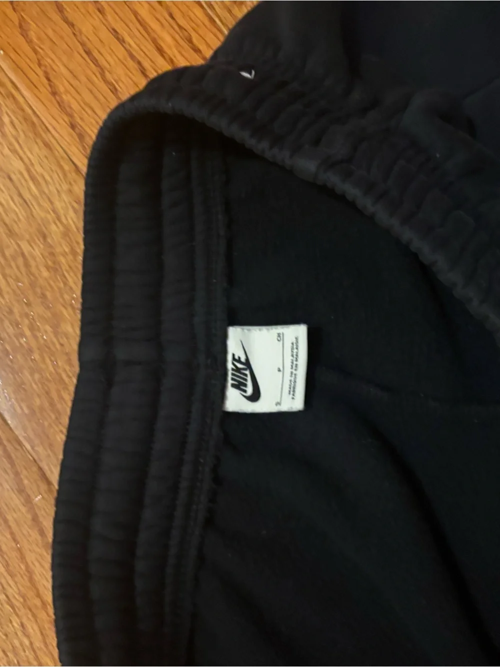 Nike Women’s Black Athletic Shorts with White Swoosh